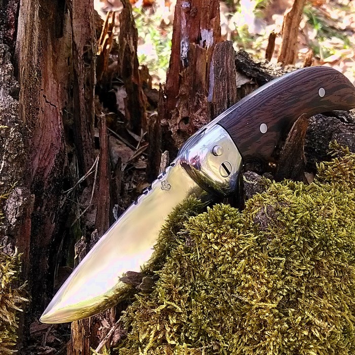 how to close a pocket knife with no button